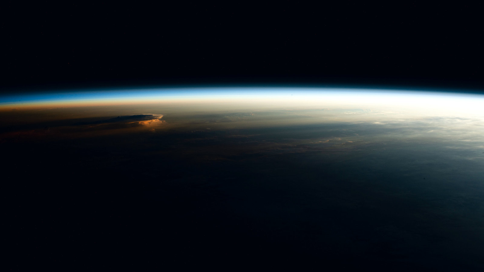 Earth's limb at orbital sunrise, seen from the International Space Station